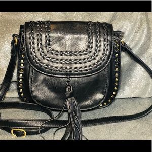 Gorgeous, Antik Kraft whipstitch saddle bag.